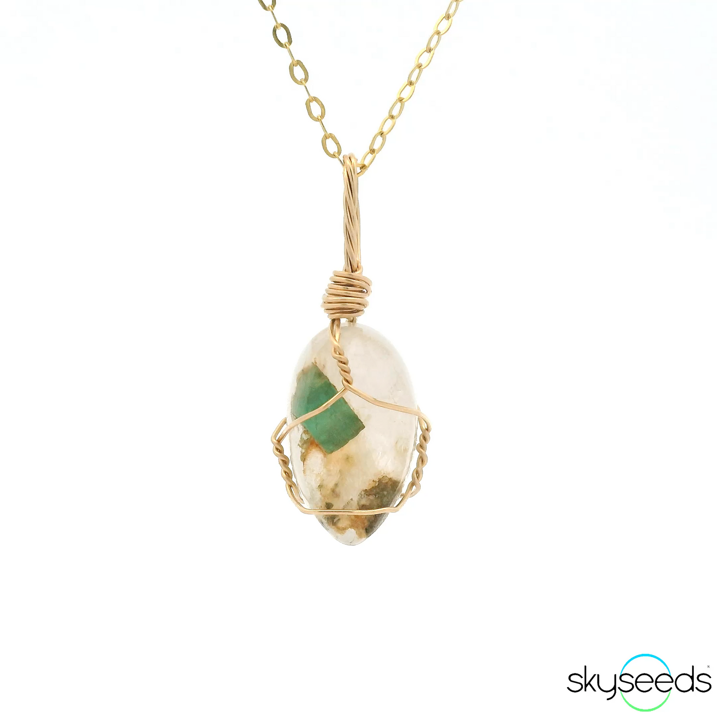 
                  
                    Emerald and Quartz Pendant
                  
                