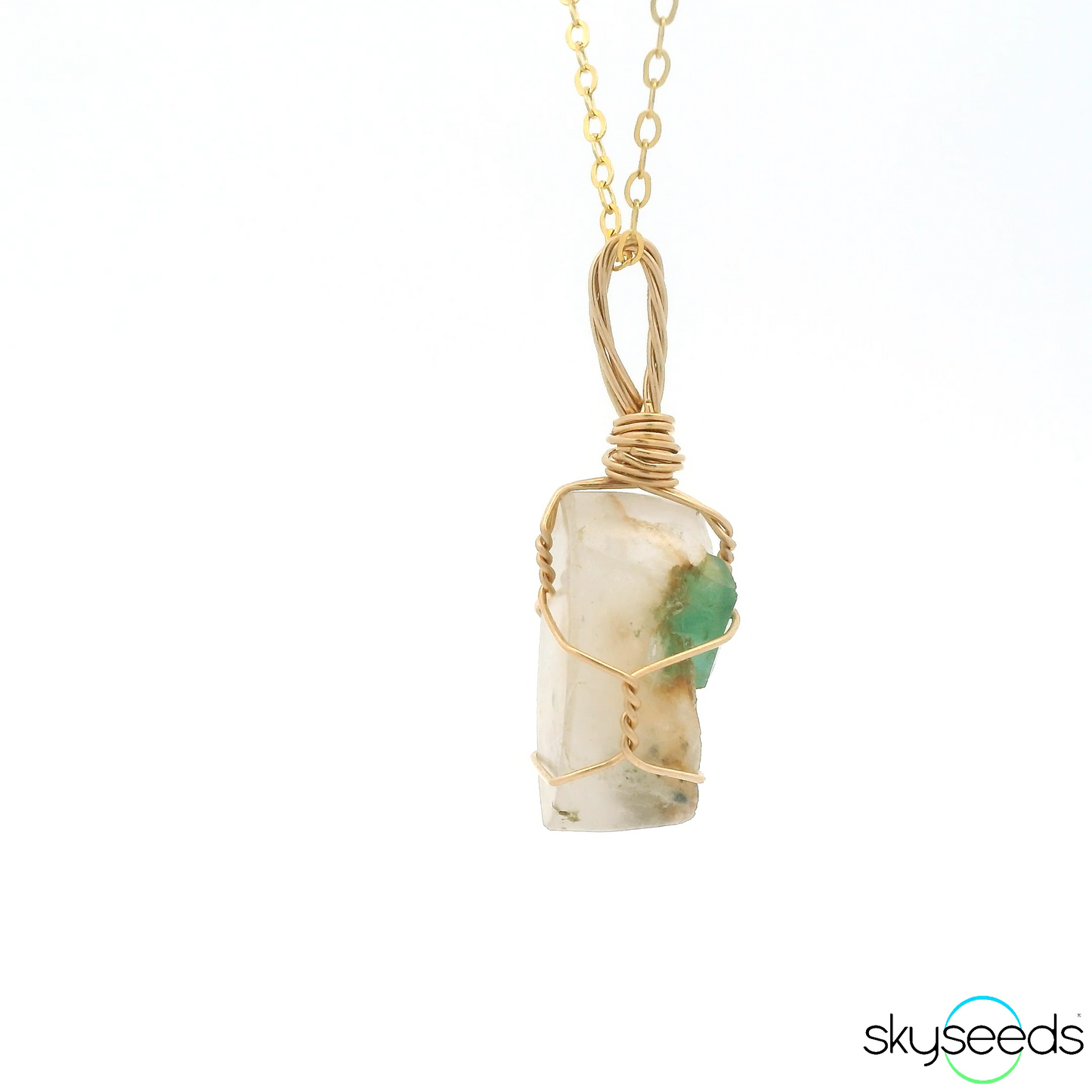 
                  
                    Emerald and Quartz Pendant
                  
                