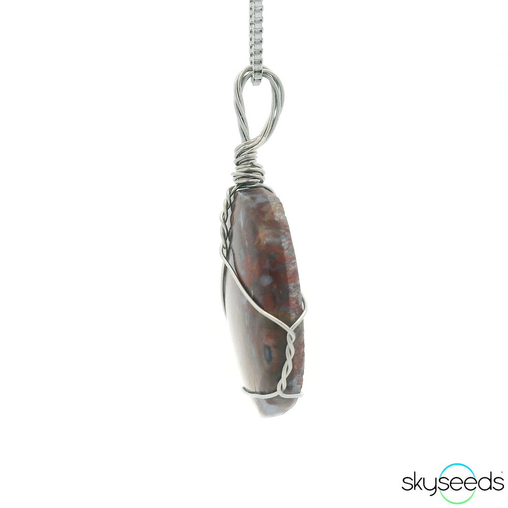 
                  
                    Red Plume Agate Pendant
                  
                