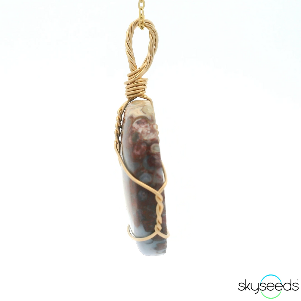 
                  
                    Red Plume Agate Pendant
                  
                