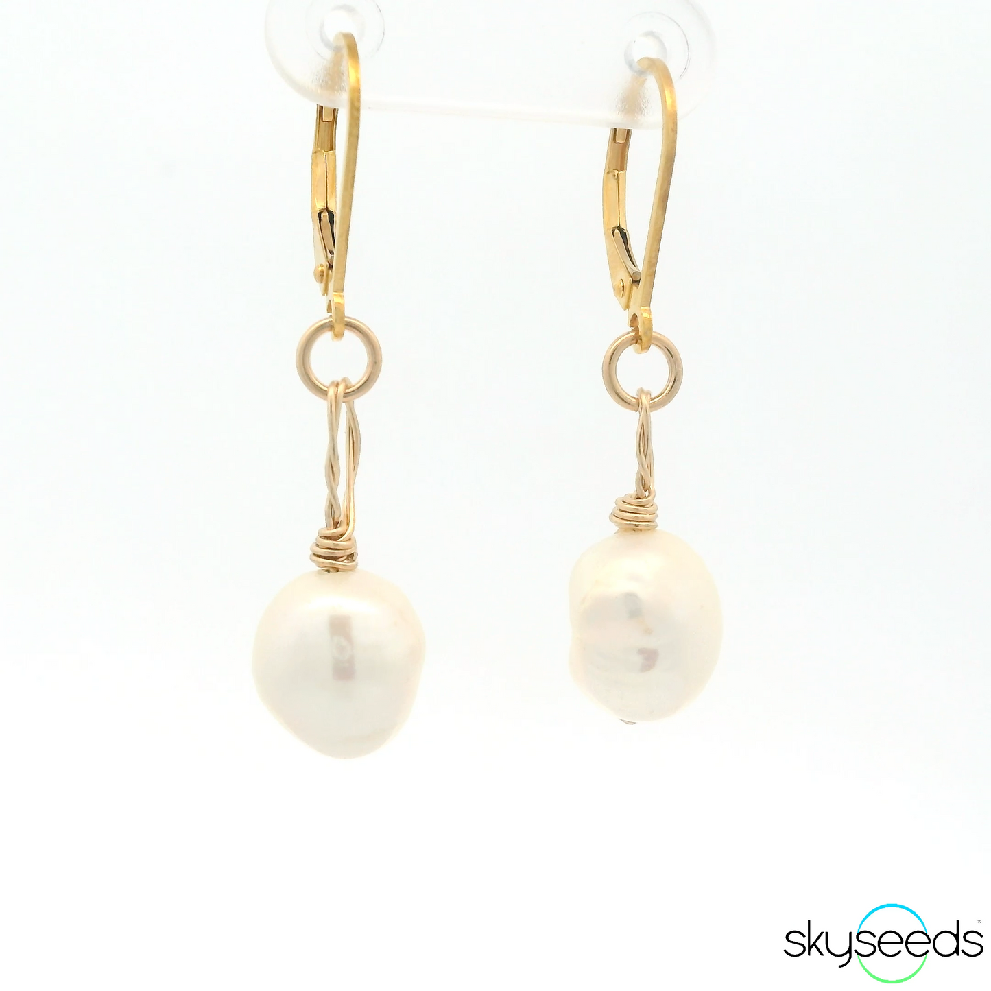 
                  
                    Pearl Earrings
                  
                