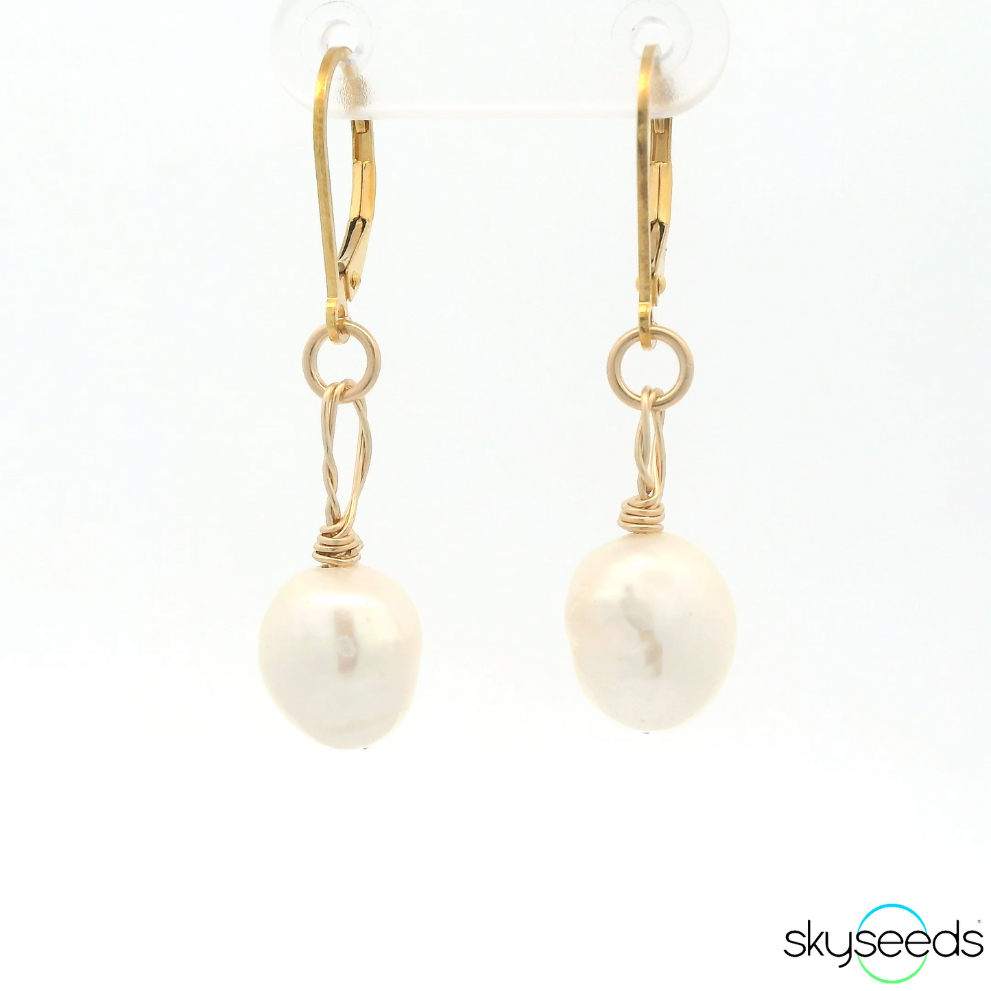 
                  
                    Pearl Earrings
                  
                